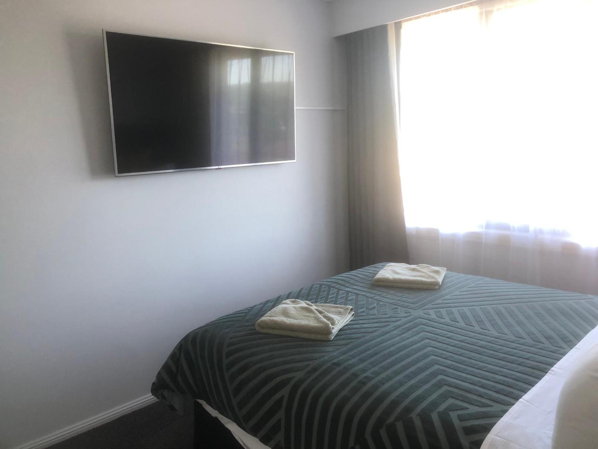 White Manor Motel Кума Екстериор снимка