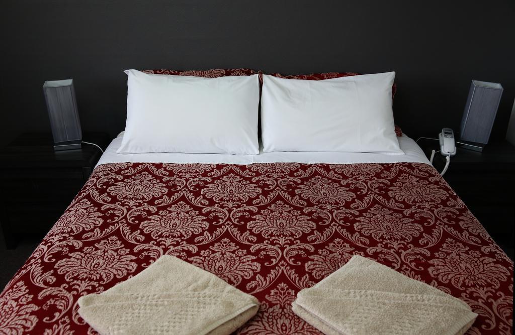 White Manor Motel Кума Екстериор снимка